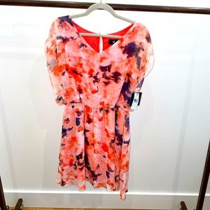 Brand new with tags! Cute summer dress. Size Large.